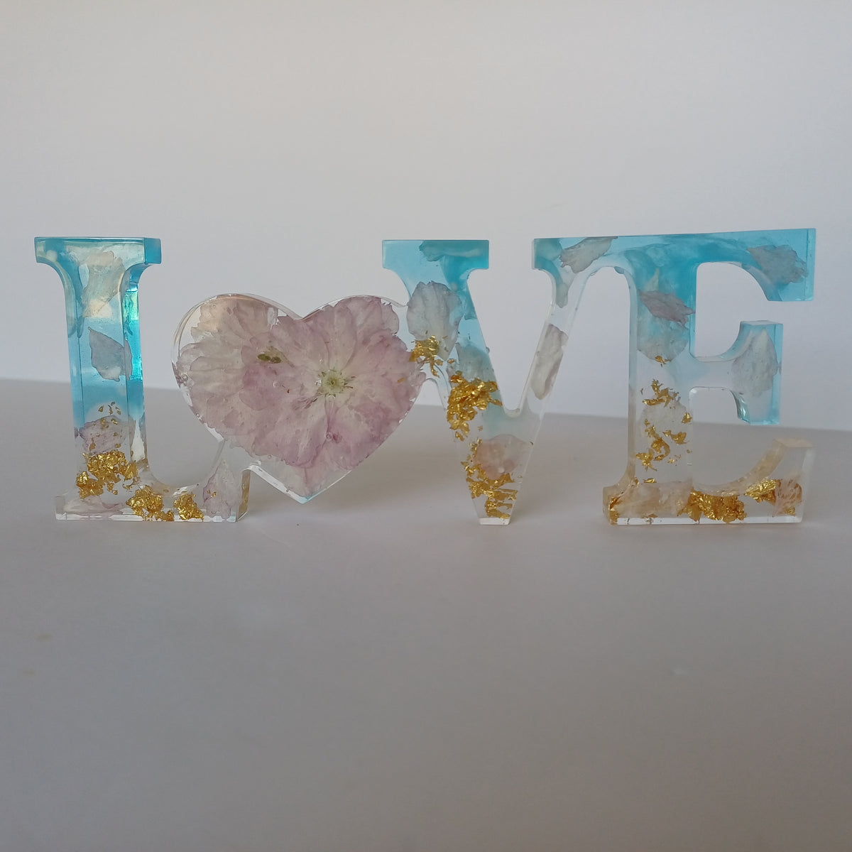 Floral resin word signs, Love Home Family, with preserved flowers, styled display