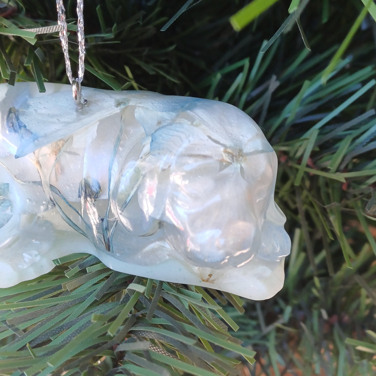 Christmas ornament - handmade resin pet figurine with real pressed flowers, top view