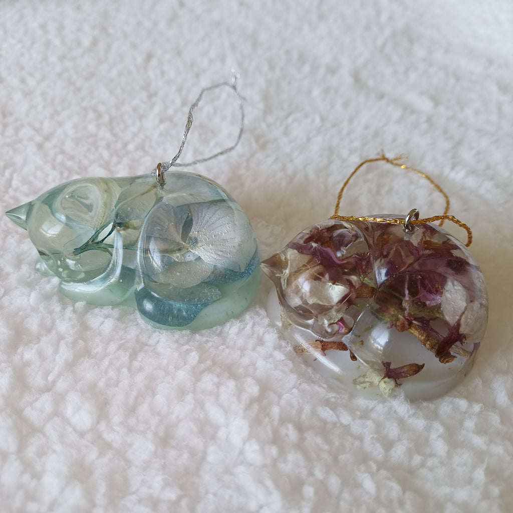 Christmas ornament - handmade resin pet figurine with real pressed flowers, displayed